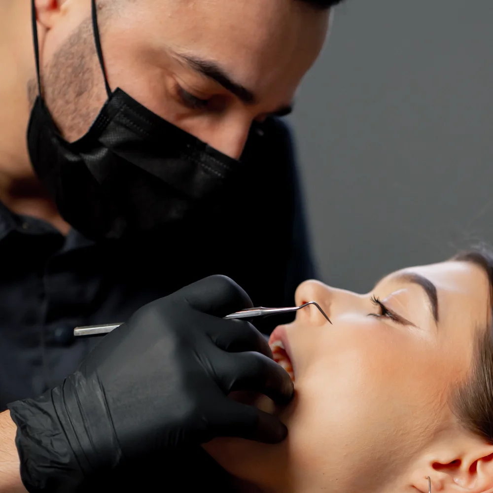 close-up-in-a-dental-office-male-dentist-examines-TG8EWME.webp